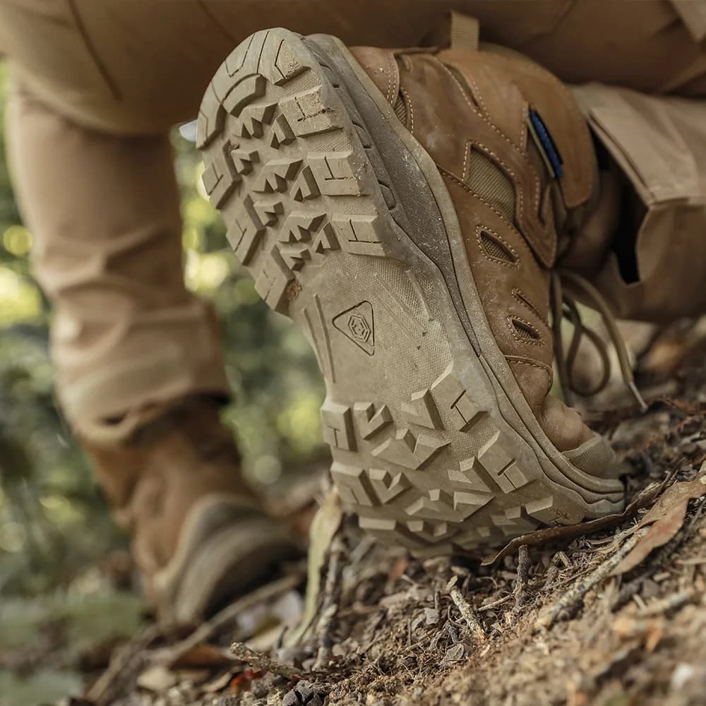 Walker tactical boots used on uneven outdoor terrain