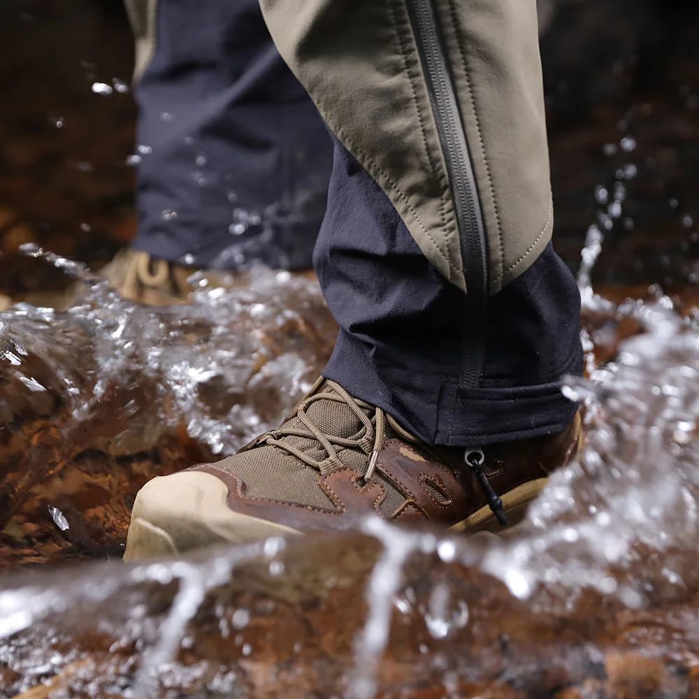 Walker boots photographed on wet ground